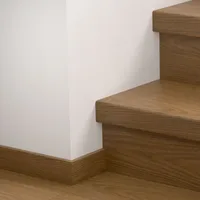 Quick-Step QSVSTRBSP - 40279 : Recouvrement d’escalier en vinyle – Blos Chêne cacao 1243x127x54 mm