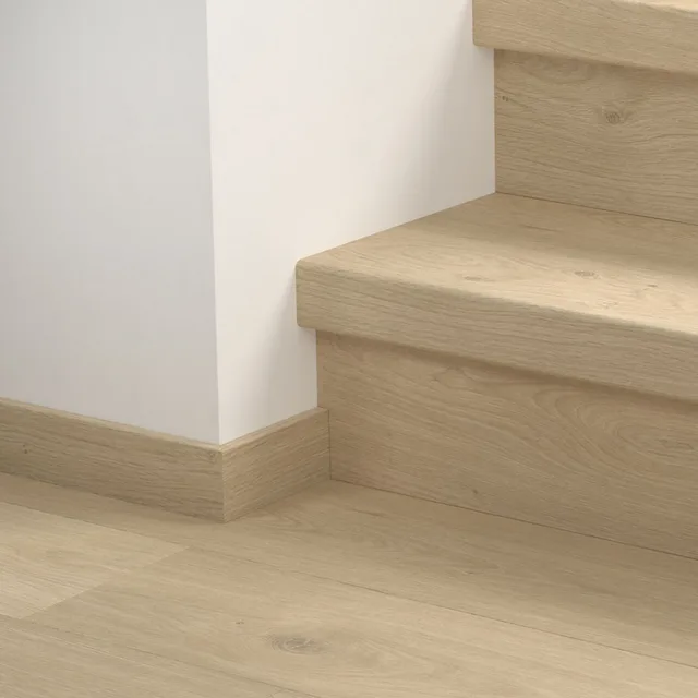Quick-Step QSVSTRBSP - 40322 : Recouvrement d’escalier en vinyle – Blos Chêne littoral sable 1243x127x54 mm